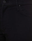 Close-up of black jeans with stitching details