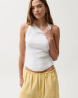 Nissi Tank Top Soft White front view with yellow pants