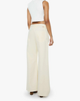 Woman wearing a white sleeveless top and cream-colored wide-leg pants on a white background