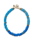 Blue beaded necklace with gold accents on a white background