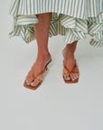 Brevel Vinyl Heels on feet, close up
