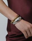 Jenny Bird Gia Mega Bangle in Gold on model
