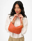Petite Moyen Messenger Saltillo Diagonal Woven held up by model