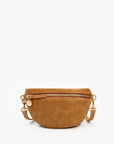 A small tan suede half-moon belt bag with a top zipper, gold-tone hardware, and a matching adjustable shoulder strap, shown against a plain white background.