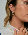 Gina 1" Earrings Two Tone close up on model
