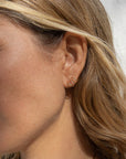 Quinn Hoop Earrings side view on model
