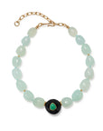 Necklace with green beads and a black clasp on a white background