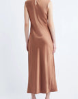 model wearing a cinnamon colored sleeveless midi dress on a white background, back