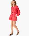 Jomi Mid Rise Cotton Short side view, hands in pockets