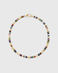A gold-tone beaded necklace with small cylindrical beads in multiple colors including blue, green, red, and purple, arranged in alternating gold and multicolor bead patterns, shown on a light gray background.