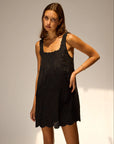 Nadia Dress front view of model in front of white wall