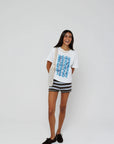 model wearing beachside summers short sleeve tee with stripe shorts on a white background