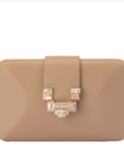 Beige clutch bag with decorative clasp on a white background