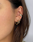 Adina Reyter Gold Huggie Hoops On Ear