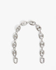 Silver chain bracelet on a white background