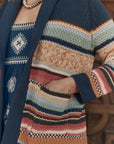 The Mountain Lodge Cardigan close up, hand in pocket