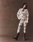 The Stadium Sweatpant in riding horses print full body