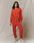 The College Sweatshirt in Persimmon full body front
