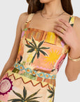 model wearing the april print romper on a white background
