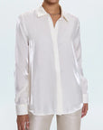 White shirt worn by a person on a white background