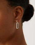 Teeni Detachable Link Earrings in Two-Tone closer up side view on model