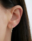 Single Diamond Hook Stud Earring on ear