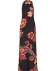 A halter-neck maxi dress with a black base and a vibrant red, orange, and beige paisley and floral pattern, shown against a plain white background.