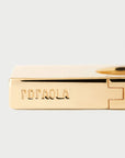 Gold bracelet with 'PDPAOLA' engraving on a light gray background