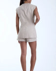Aurelia Vest full body back view on model in front of white background