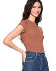 model wearing the essential short sleeve tee in toast with jeans on a white background