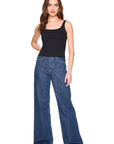 everyday tank in black on a model wearing jeans with a white background