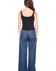 everyday tank in black on a model wearing jeans with a white background back view