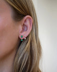 Single Diamond Pear and Round Illusion Stud Earring on ear in second hole