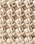 Close-up of a gold woven pattern