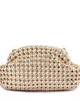 Gold woven clutch bag on a white background