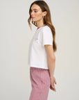 The Signature Chest Logo Ringer Top close up side view on model