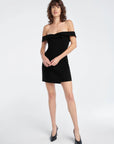 The Payback Dress front view, hands in front of body
