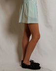 julie stripe short on a model with a cream background, side