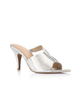 A single metallic silver mule sandal with a pointed toe, open back, and a slim high stiletto heel, shown against a plain white background.