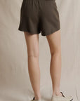 Layla French Terry Short in Dark Olive back view on model from waist down