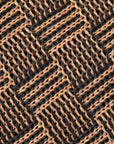Close-up of a woven pattern with black and beige lines.