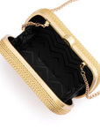 Gold clutch with black interior on a white background