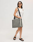 Iona Tote Bag on model's shoulder with canvas strap