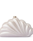 A shell-shaped evening clutch bag with a pearlescent white finish and a small gold clasp at the top, shown on a plain white background.