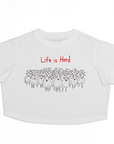 White crop top with red text 'Life is Herd' and sheep illustration on a white background