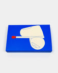 Blue rectangular object with a white and red design on a white background