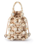 A drawstring pouch bag made of beige satin fabric and decorated with cream and beige marbled beads, featuring a top handle and drawstring ties, shown on a white background.