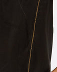 Black sleeveless top with a gold chain detail on a white background