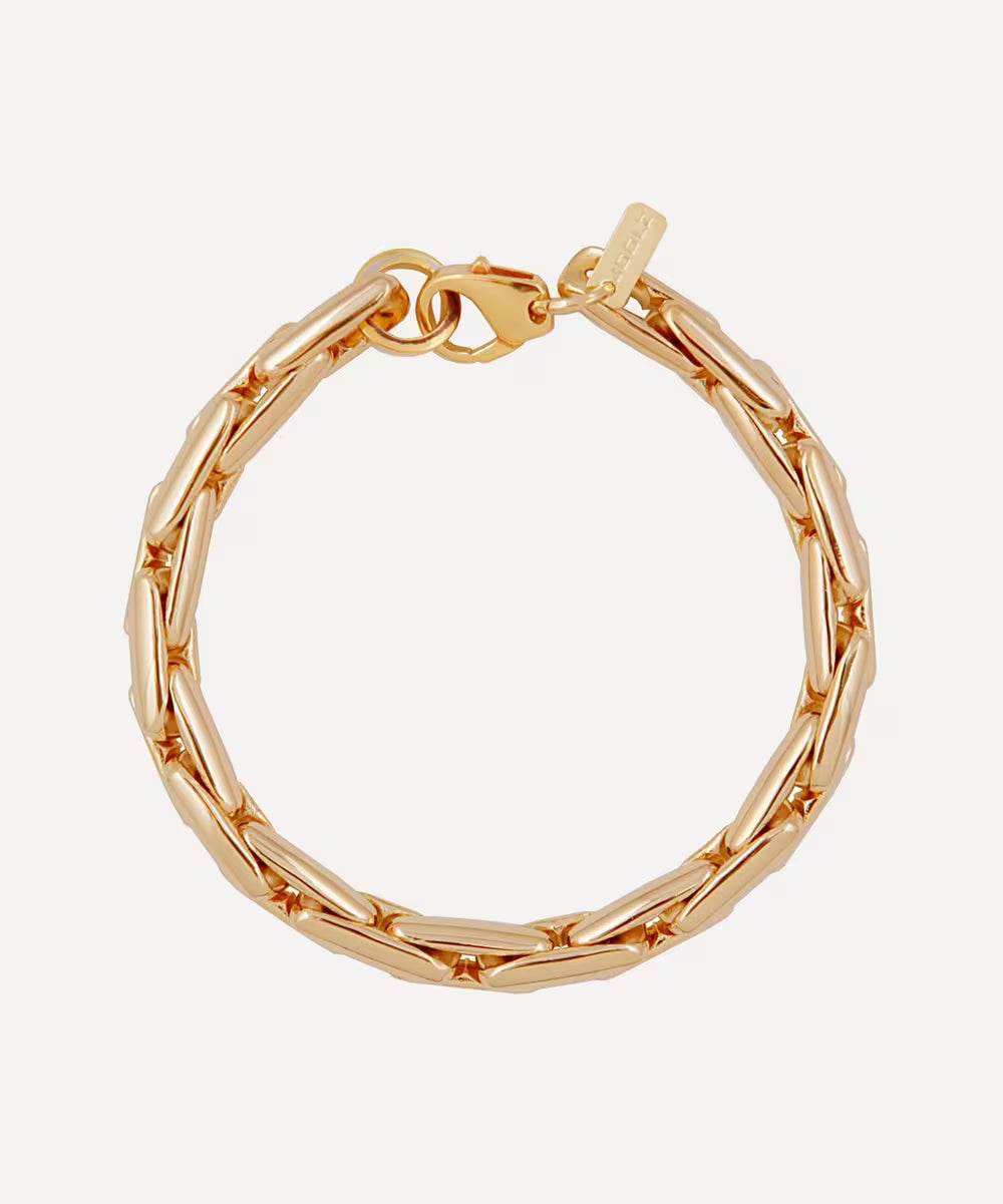 A gold-toned chain link bracelet with a textured, hammered finish and a lobster clasp, displayed on a light gray background.
