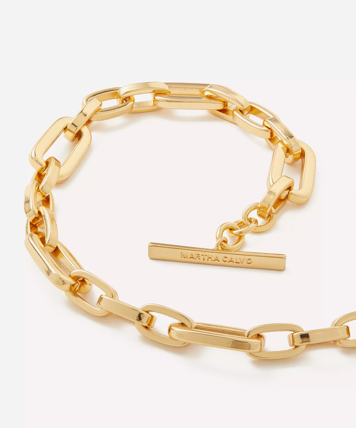 close up of a arge rectangle link necklace on a white background